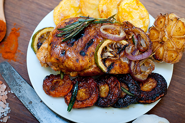 Image showing roasted grilled BBQ chicken breast with herbs and spices 