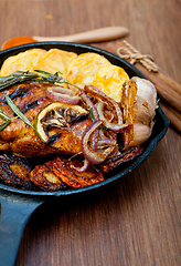 Image showing roasted grilled BBQ chicken breast with herbs and spices 