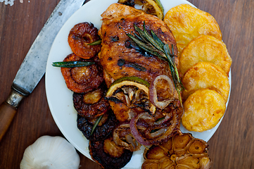 Image showing roasted grilled BBQ chicken breast with herbs and spices 