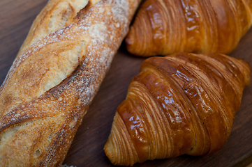 Image showing French fresh croissants and artisan baguette tradition