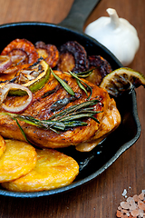 Image showing roasted grilled BBQ chicken breast with herbs and spices 