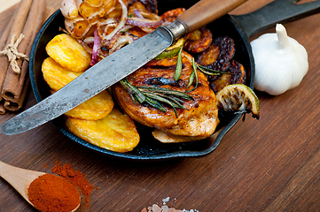 Image showing roasted grilled BBQ chicken breast with herbs and spices 