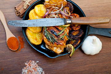 Image showing roasted grilled BBQ chicken breast with herbs and spices 