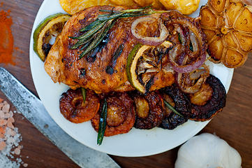 Image showing roasted grilled BBQ chicken breast with herbs and spices 