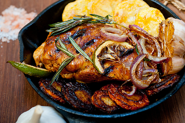 Image showing roasted grilled BBQ chicken breast with herbs and spices 