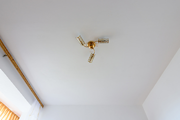 Image showing White plastered ceiling in the interior of a room with painted walls