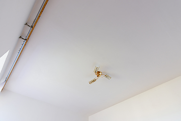 Image showing Plastered and white painted ceiling in the interior of the room