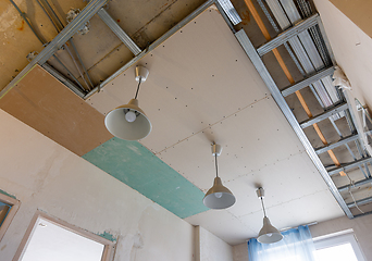 Image showing Unfinished two-level plasterboard ceiling in the interior of a room in a new building