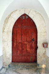 Image showing Red church door