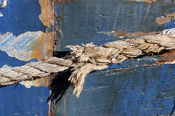 Image showing Close-up of line holding boat to shore