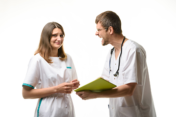 Image showing The intern is shocked by the doctor screaming at her