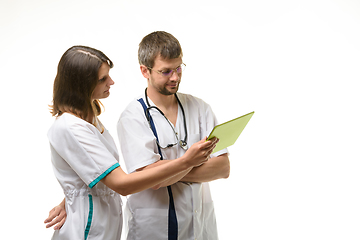 Image showing Two doctors discussing test results isolated on white background