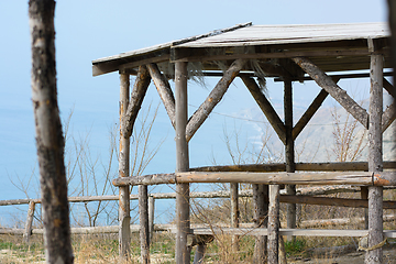 Image showing Homemade gazebo from a wooden log house