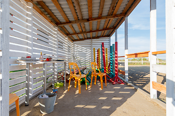 Image showing Open room under a canopy on a horse farm, for storing various implements