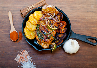 Image showing roasted grilled BBQ chicken breast with herbs and spices 