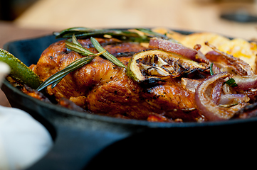 Image showing roasted grilled BBQ chicken breast with herbs and spices 