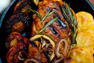 Image showing roasted grilled BBQ chicken breast with herbs and spices 