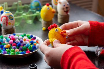 Image showing A child makes gifts with his own hands for Easter