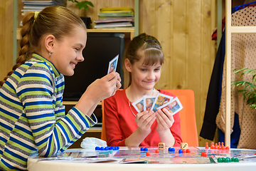 Image showing Happy kids playing board games