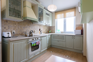 Image showing Interior of a modern spacious kitchen in country style