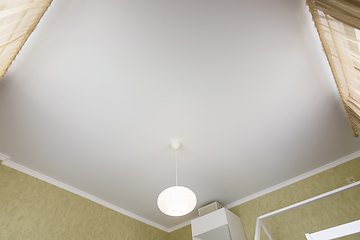 Image showing Stretch white matte ceiling close-up in the interior of a bedroom