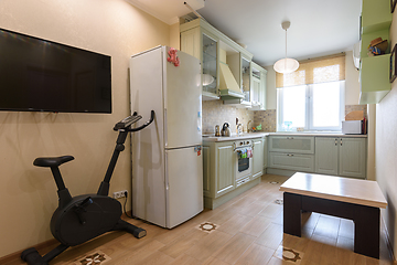 Image showing Interior of a spacious living room combined with a kitchen