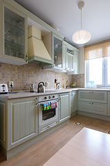 Image showing Interior of a modern corner kitchen in an apartment