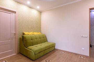 Image showing Fragment of the living room interior in a small apartment, the sofa stands against the wall