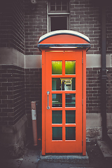 Image showing Vintage UK red phone booth