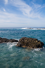 Image showing beautiful wild beach with black sand