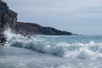 Image showing beautiful wild beach with black sand