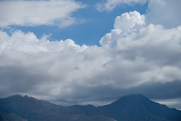 Image showing volcanic mountains and sky with clouds