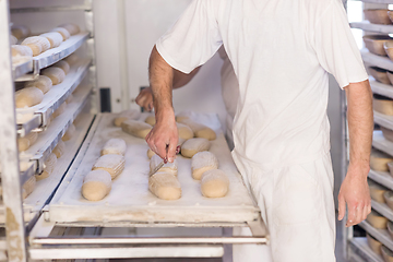 Image showing bakers preparing the dough