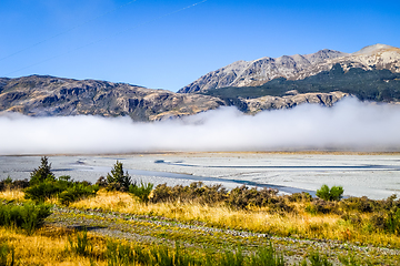 Image showing Yellow forest and river in New Zealand mountains