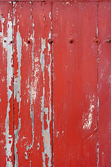 Image showing Old wood board painted red