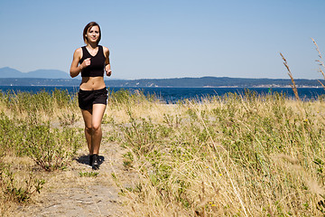 Image showing Sporty caucasian girl running