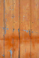 Image showing Old wood board painted orange