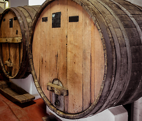 Image showing wood wine barrels in a winery