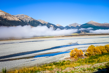 Image showing Yellow forest and river in New Zealand mountains