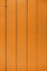 Image showing Old wood board painted orange