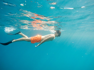 Image showing Young boy Snorkel swim in red sea