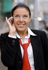 Image showing businesswoman speaking by phone