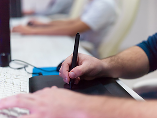 Image showing Closeup of Graphic Designer Working at Workplace