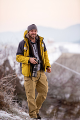 Image showing portrait of male photographer at winter nature