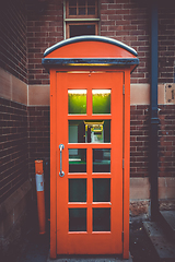 Image showing Vintage UK red phone booth