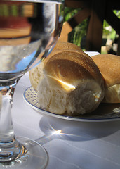 Image showing plate of bread on a lunch table