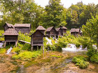 Image showing Old wooden waterills