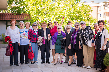 Image showing group portrait of senior people with geriatric nurse