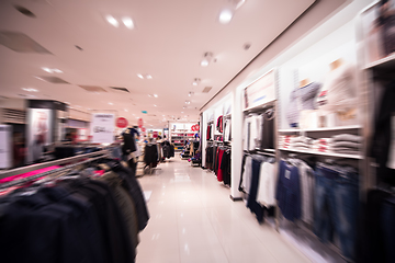 Image showing little cute girl in the clothing store