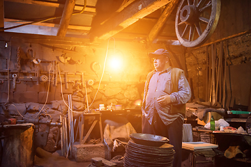 Image showing portrait of confident senior blacksmith